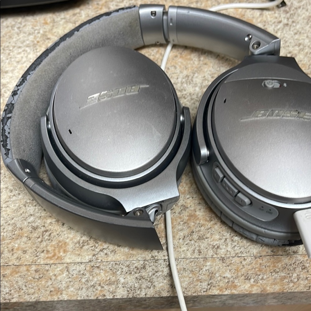 Bose Silver Over-Ear Headphones with Sleek Design—well used